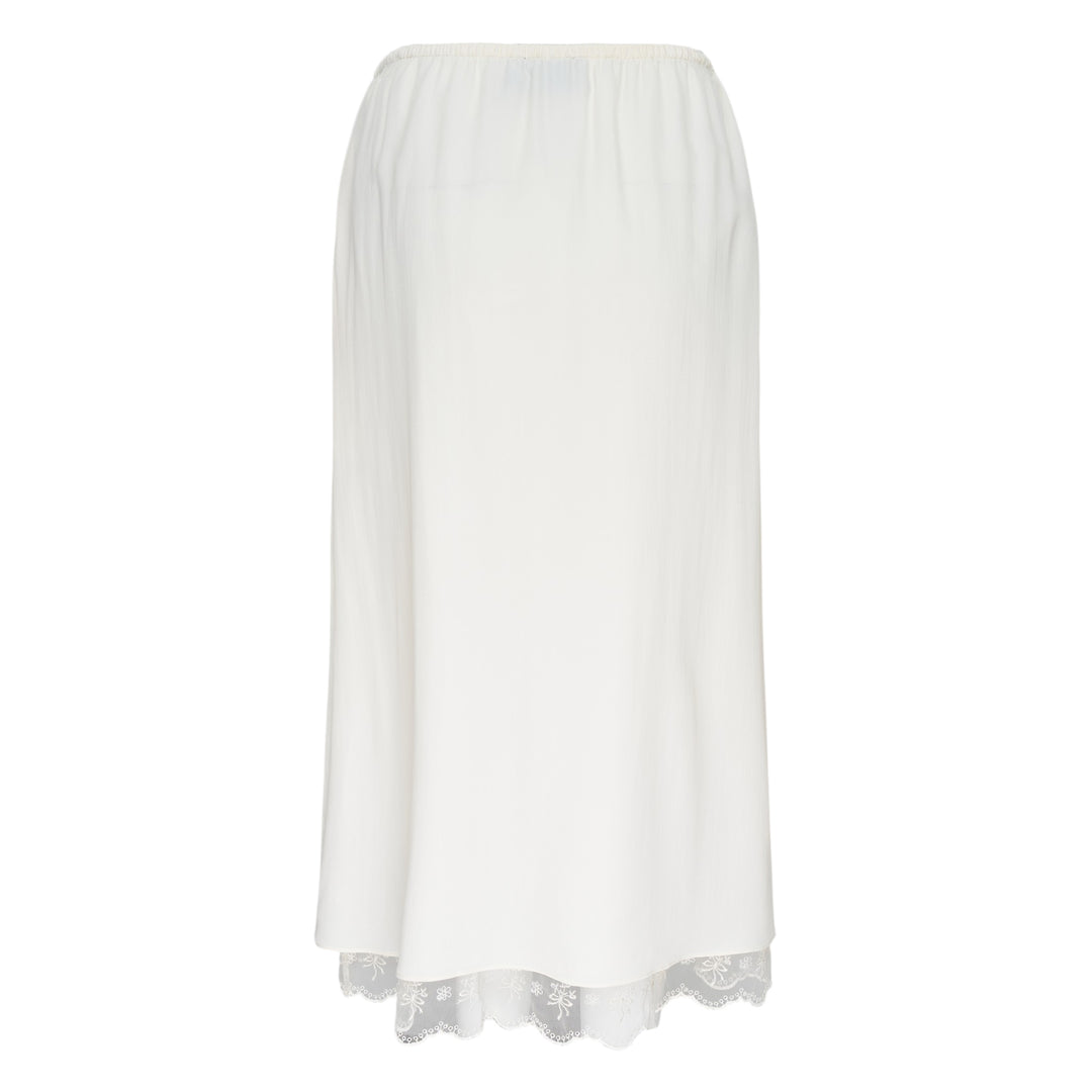 Simone Rocha ivory crepe negligee midi skirt with elasticated waist and floral embroidered lace scalloped hem trim, flat lay on white background