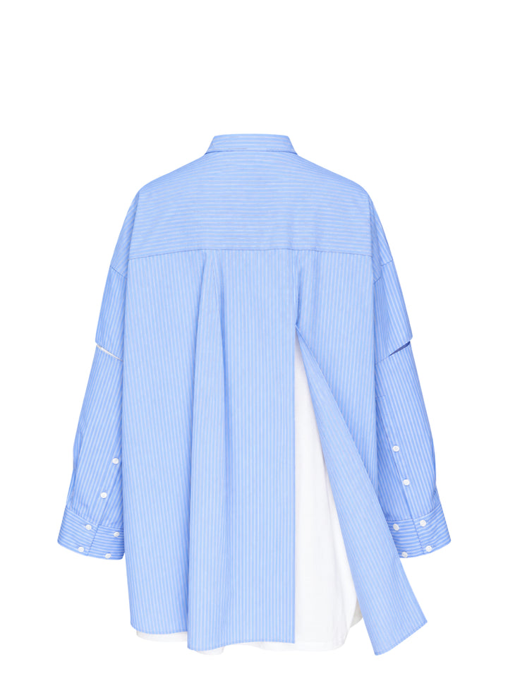 Enfold pale blue pinstripe oversized shirt with deconstructed cut-out sleeves, mandarin collar, white button placket, and a contrast white underlayer at the hem - view 4