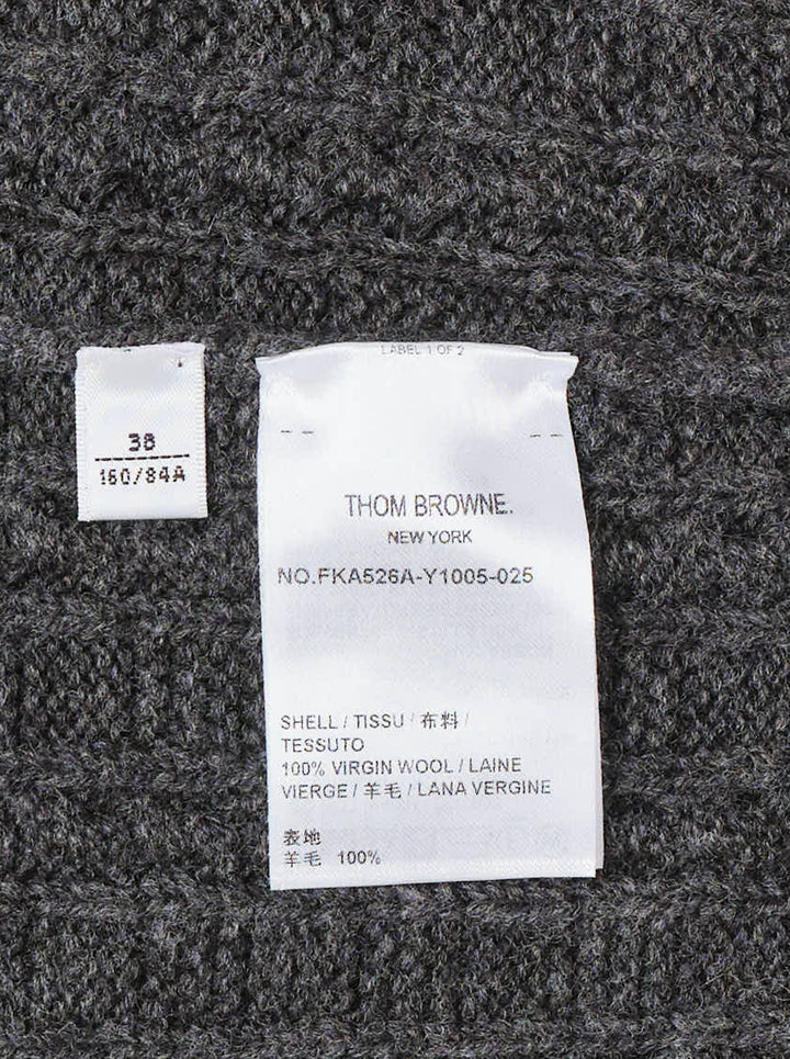 Thom Browne charcoal cable-knit crewneck sweater with cream anchor intarsia on the front and signature 4-bar stripe on the sleeve - view 3