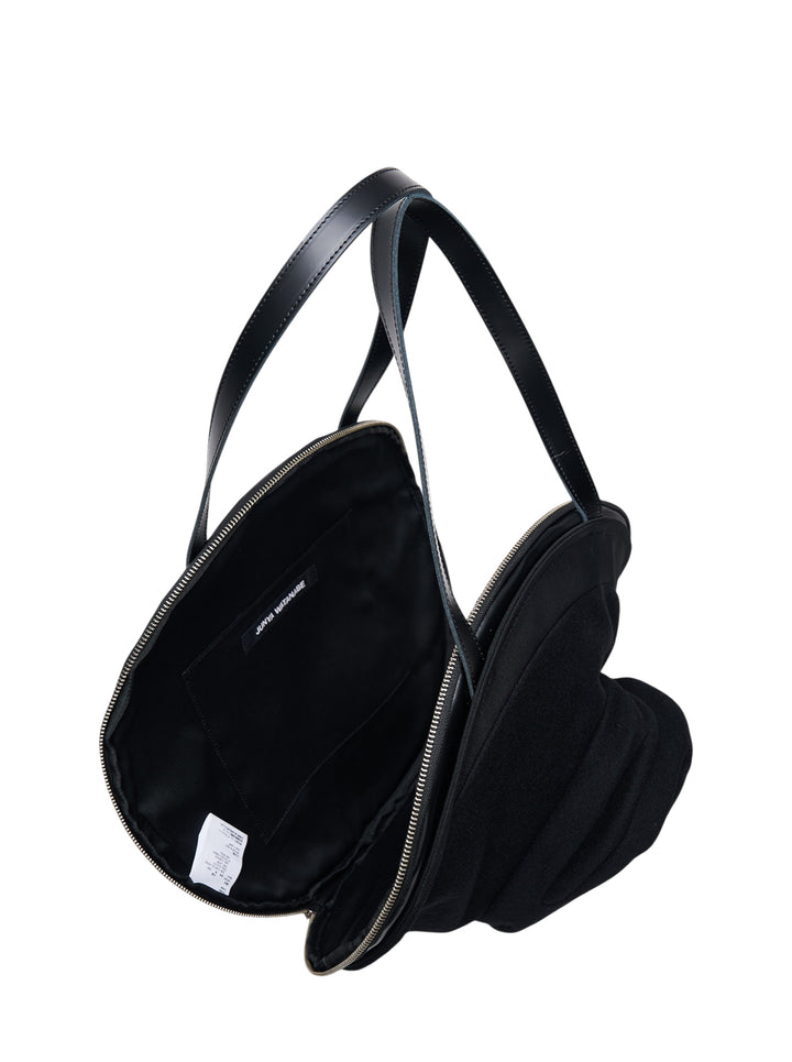Junya Watanabe black circular top handle bag with three-dimensional draped rose appliqué on the front, leather strap, and silver-tone zip closure - view 3
