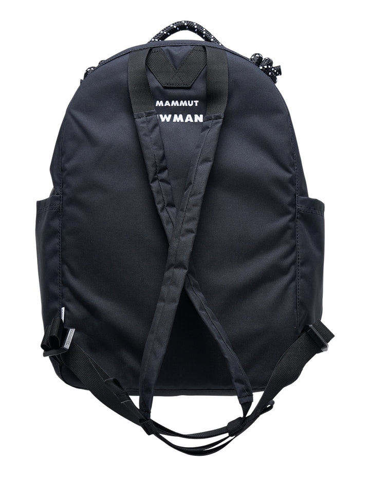 Junya Watanabe x Mammut black backpack with front zip pocket and a plush black mammoth charm clipped to the base - view 2