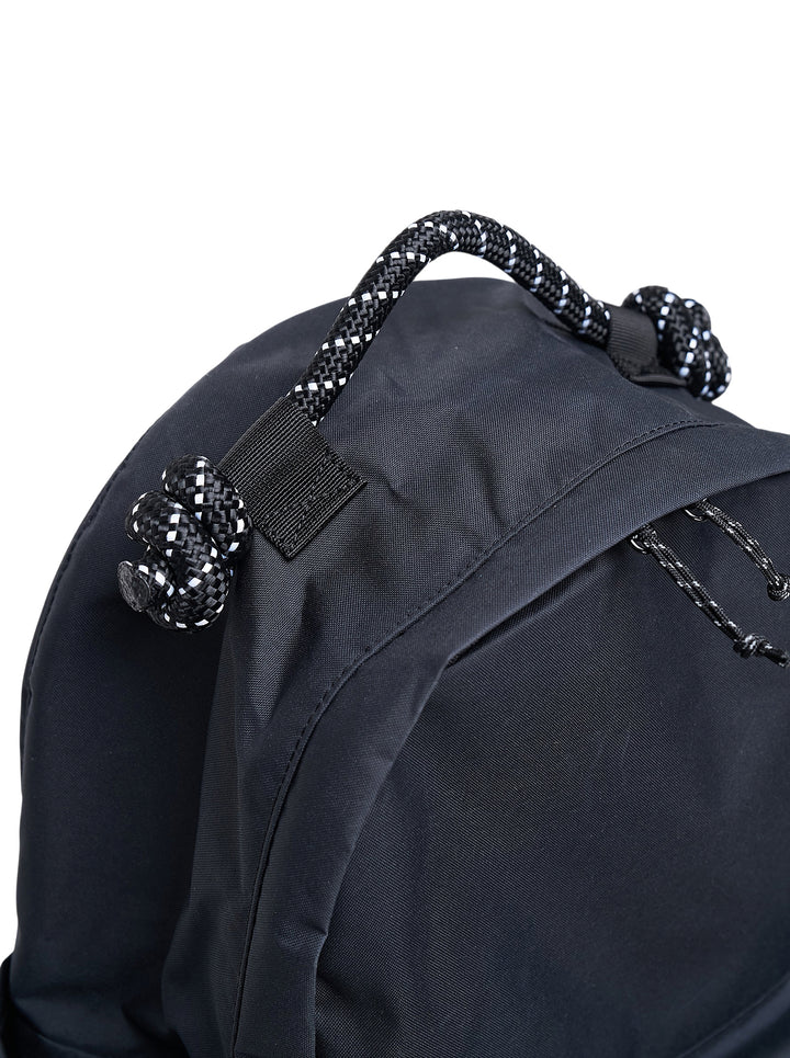 Junya Watanabe x Mammut black backpack with front zip pocket and a plush black mammoth charm clipped to the base - view 4
