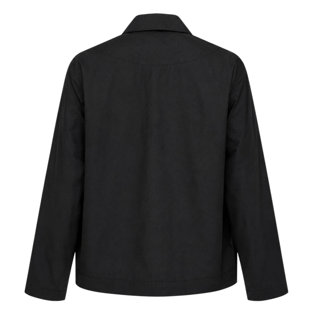 Tao black cotton broadcloth blouse with cascading ruffle bib front, button fastening, spread collar, and long sleeves, laid flat on white background