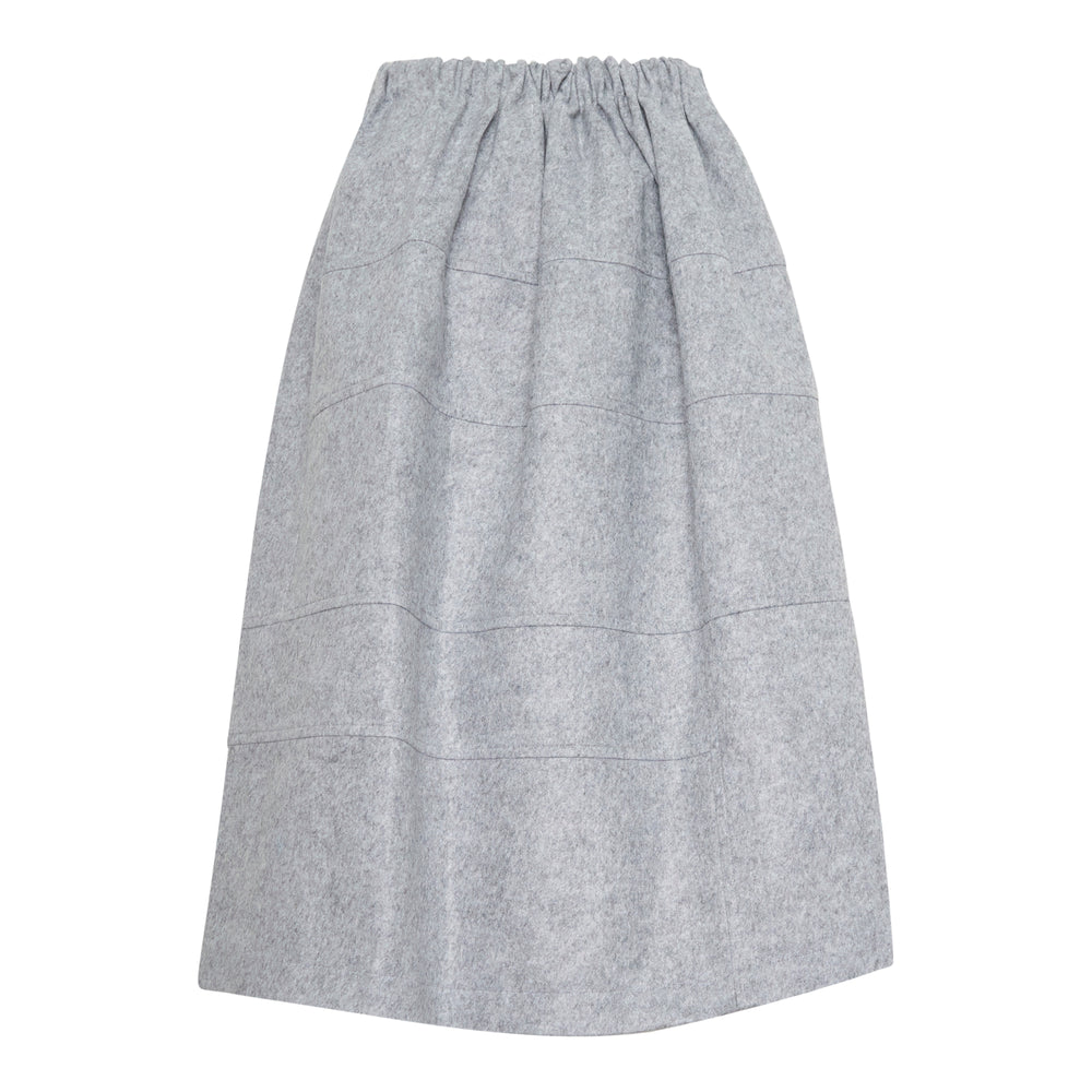 Tao A-Line midi skirt in corduroy with oversized gingham heart print in pink, cream, and amber, contrast grey side panels, and an elasticated gathered waistband