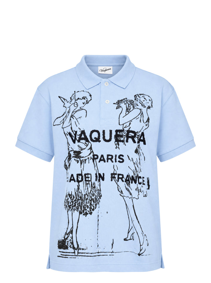Vaquera light blue short-sleeve polo with a black flocked flapper illustration and Vaquera Paris Made in France print on the front