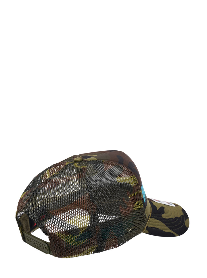 Ashley Williams Camo Imposter Trucker Hat in woodland camouflage with bold cyan embroidered 'IMPOSTER' lettering across the structured foam front panel - view 2
