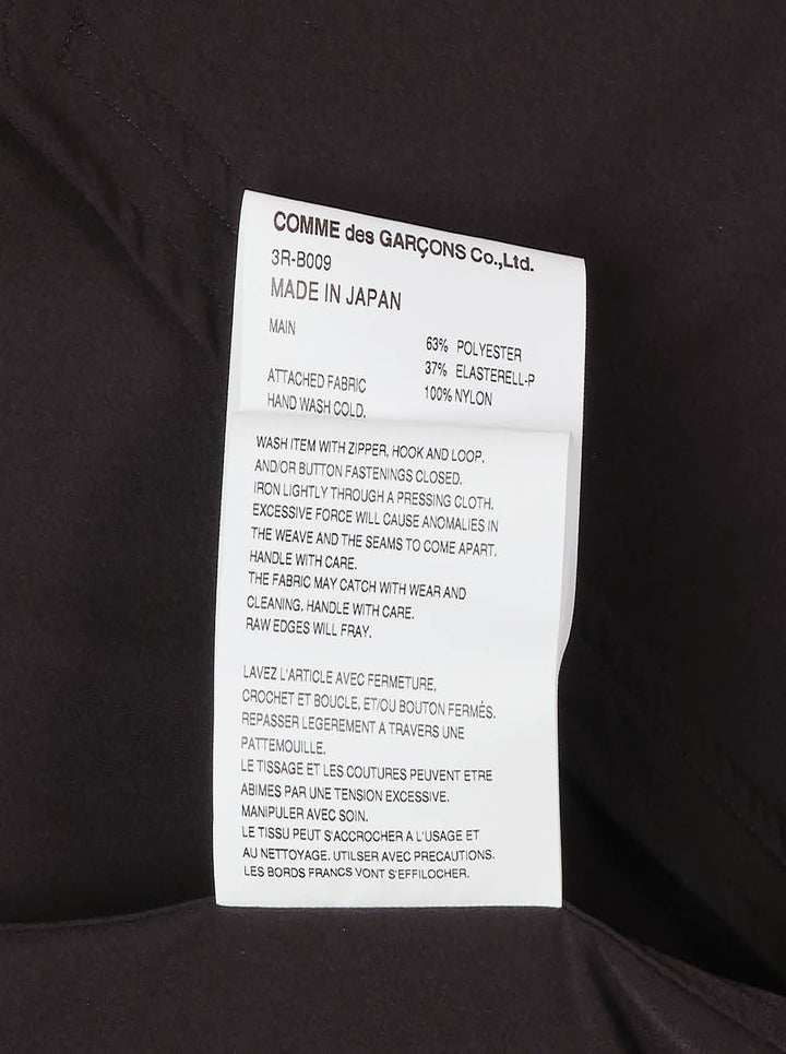Noir Kei Ninomiya black long-sleeve hooded blouson with ruffled black tulle trim at the hood, cuffs, and hem, full-length zip closure and slanted side pockets - view 4