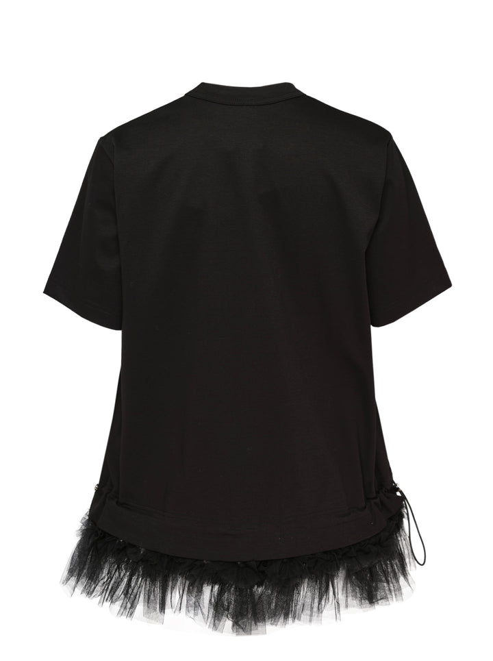 Noir Kei Ninomiya black cotton short sleeve crewneck tee with gathered tulle frill hem and drawstring waistband detail, flat lay on white background - view 2