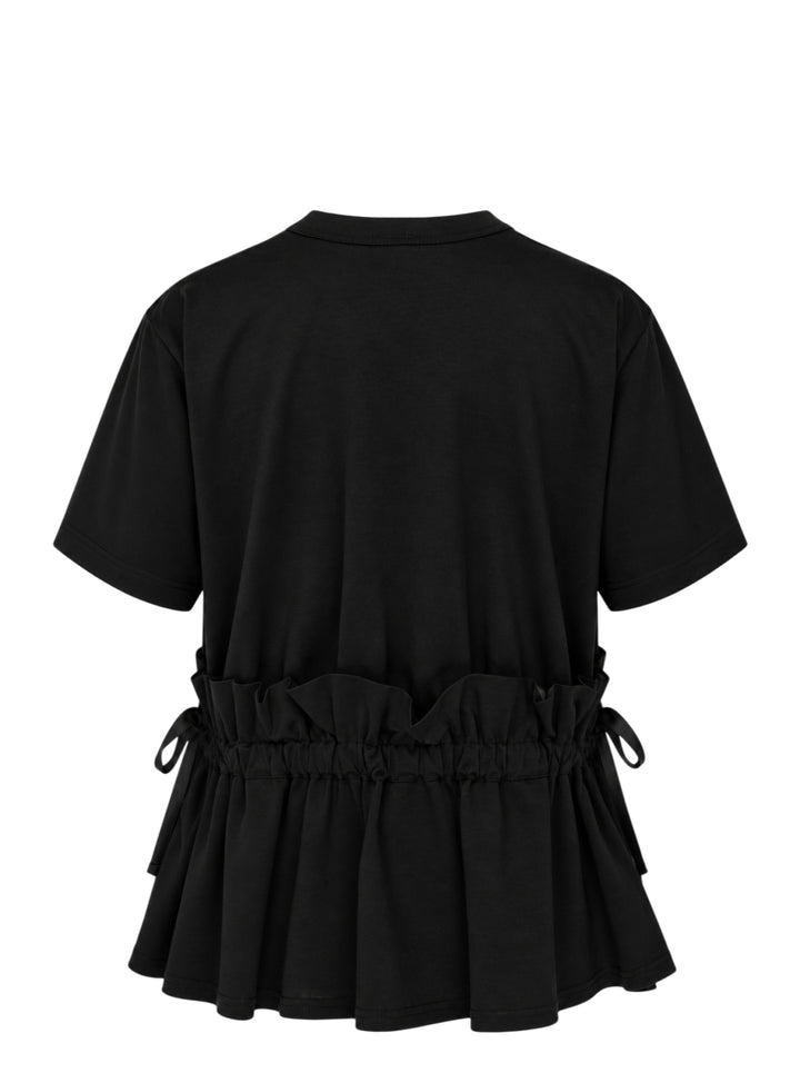 Noir Kei Ninomiya black short-sleeve cotton peplum tee with ruched gathered waistband, drawstring self-ties, and a tiered flared hem, shown flat on a white background - view 2