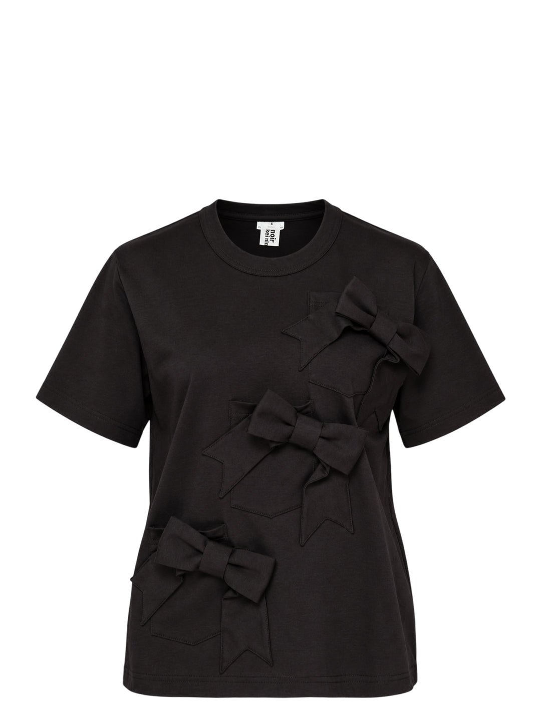 Noir Kei Ninomiya black cotton ponte tee with three dimensional bow appliqués and star-cut panels cascading diagonally down the front