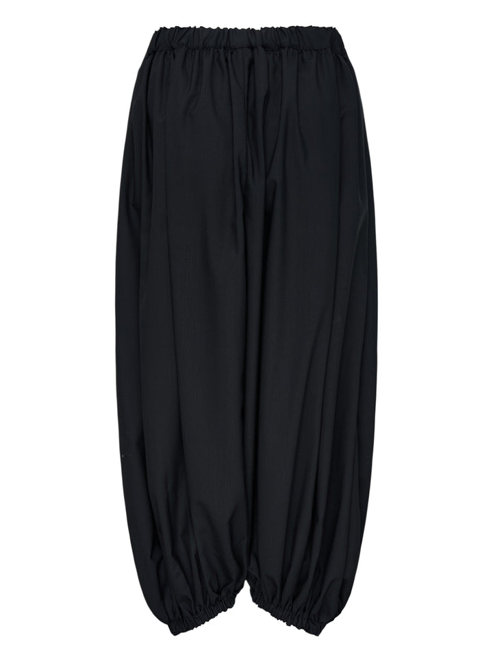 Black balloon pants with an elasticated waist and gathered hems by Comme des Garçons - view 2