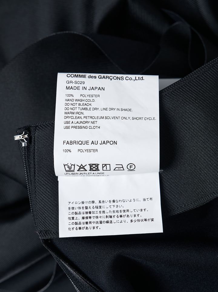 Comme des Garçons black asymmetrical midi skirt with voluminous gathered ruffle panels on both sides and a smooth structured centre panel, photographed on a white background - view 3