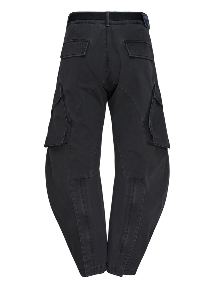 Jiyong Kim washed black multi-pocket cargo trousers with curved wide-leg silhouette, flap pockets and black buckle belt, shown front view - view 2