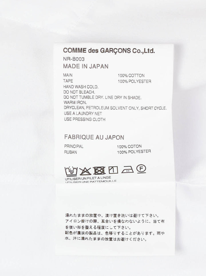 Comme des Garçons Girl white straight cut blouse with oversized collar trimmed in red grosgrain ribbon bows, shown from the front - view 3