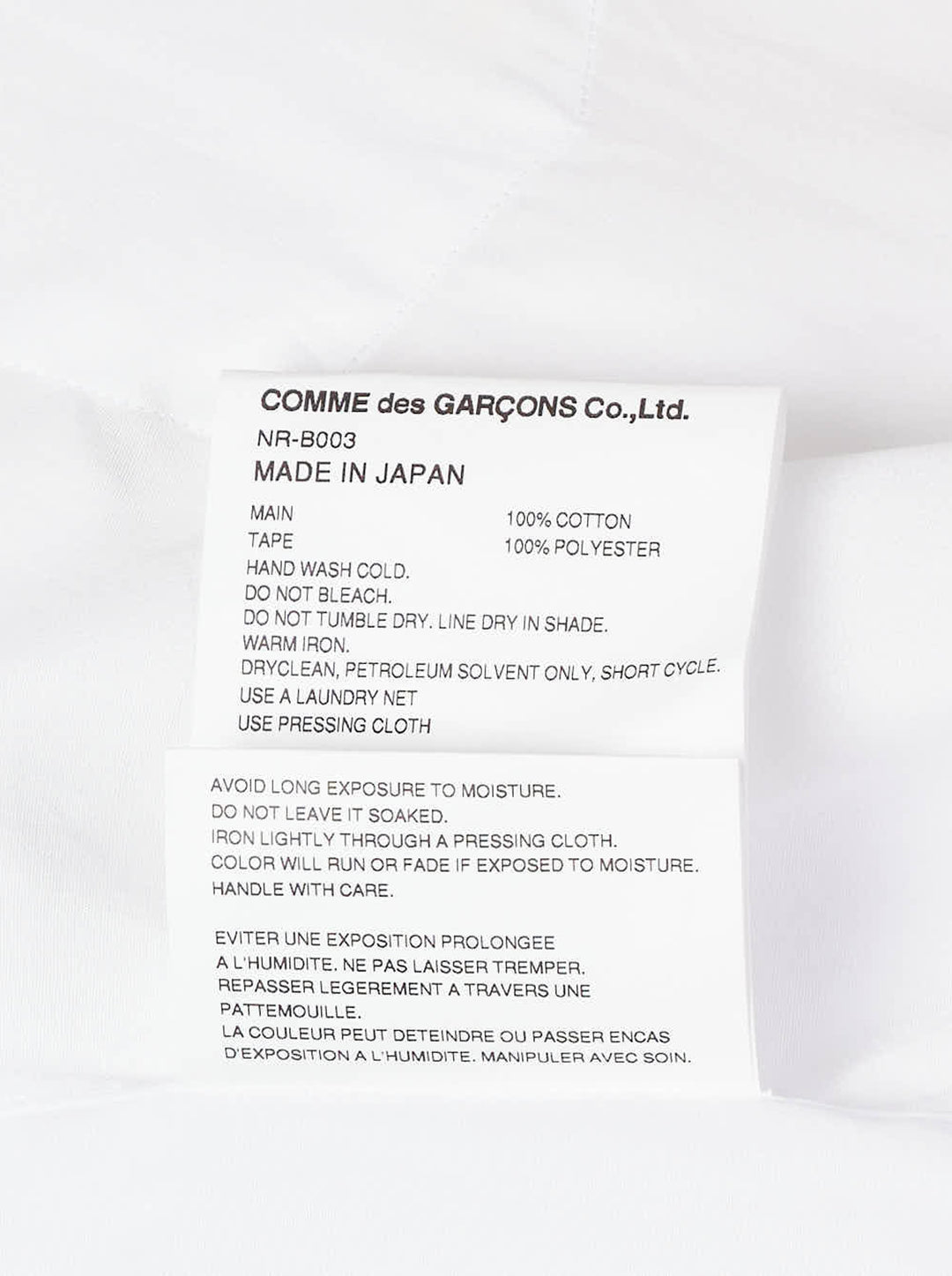 Comme des Garçons Girl white straight cut blouse with oversized collar trimmed in red grosgrain ribbon bows, shown from the front - view 4