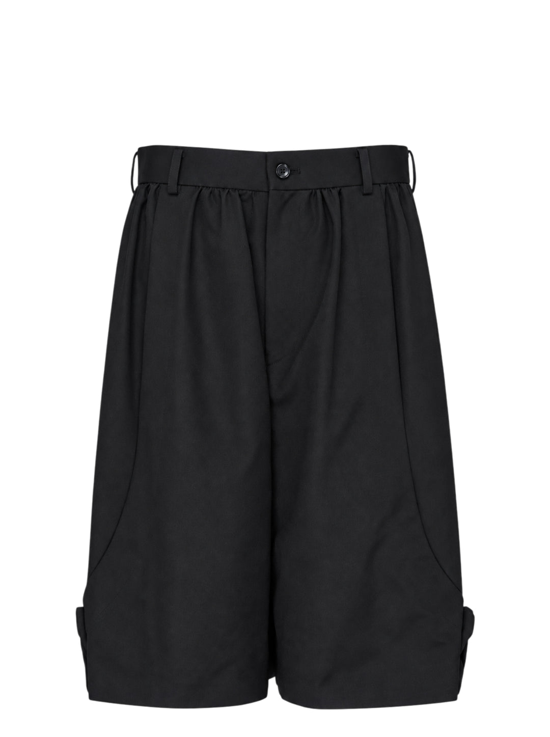 Comme des Garçons Girl black tailored knee-length shorts with wide-leg silhouette, soft pleating at the high-rise waistband, single-button closure, and cuffed hems