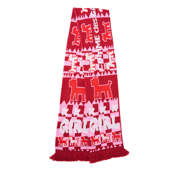 Comme des Garçons Girl holiday knitted acrylic stole with all-over reindeer and tree jacquard motifs in red, pink, and white, with fringe trim at both ends
