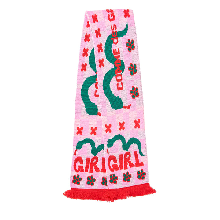 Comme des Garçons Girl knitted acrylic stole in pink gingham with teal snake motifs, red cross and cherry blossom detailing, GIRL logo lettering, and red fringe trim at both ends