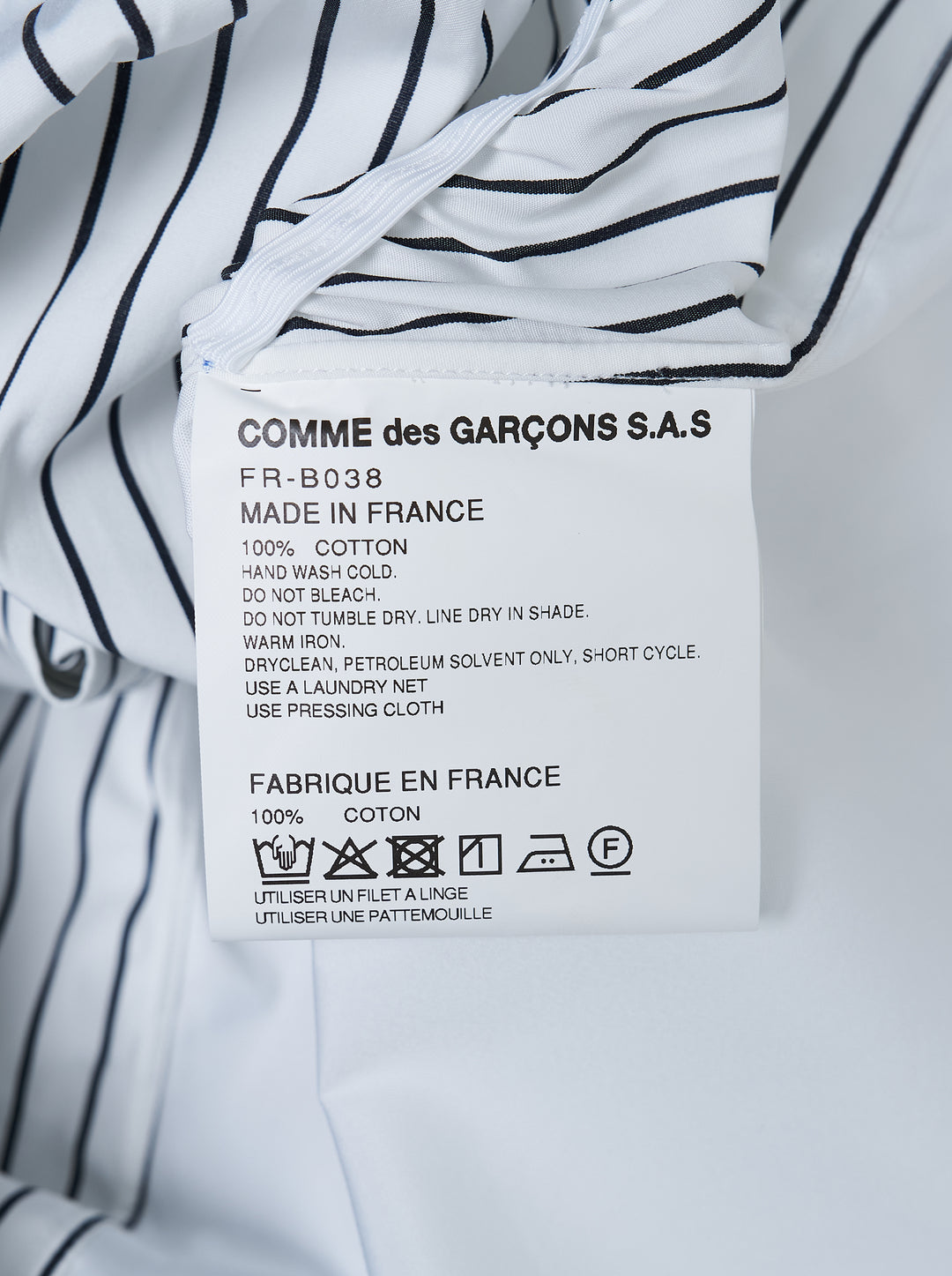 White long sleeve Comme des Garçons Shirt with a gathered black pinstripe front panel and asymmetric curved hem - view 3