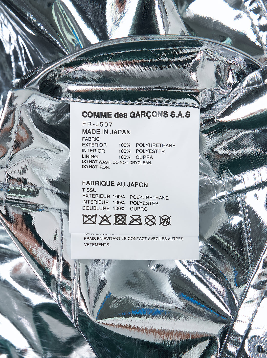 Comme des Garçons Shirt metallic silver blazer with notch lapels, three buttons and flap pockets, shown on a white background - view 3