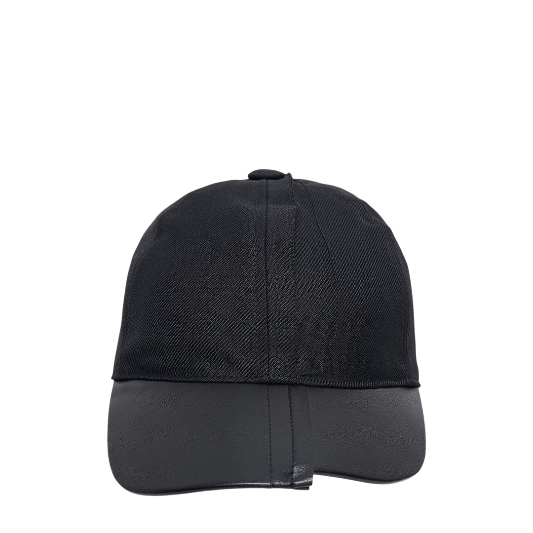 Comme des Garçons x HIZUME black velvet headband with an oversized sculptural beaded and sequined bow embellishment, shown on a white background