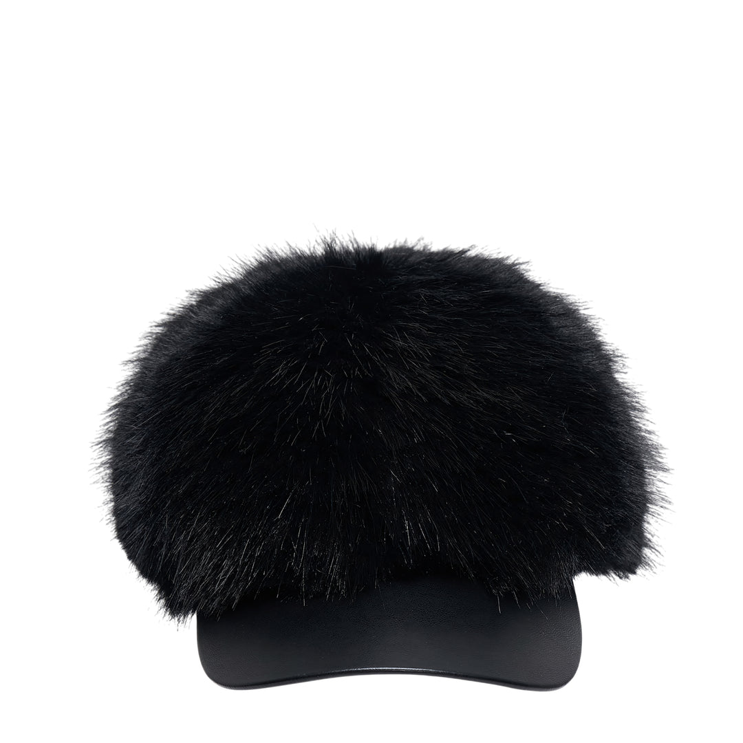 Comme des Garçons SHIRT faux fur baseball cap with a voluminous black fur dome crown and structured faux leather brim, photographed from the front against a white background