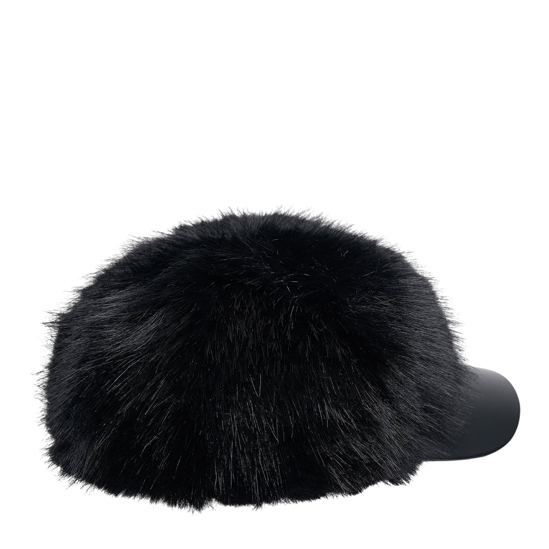 Comme des Garçons SHIRT faux fur baseball cap with a voluminous black fur dome crown and structured faux leather brim, photographed from the front against a white background