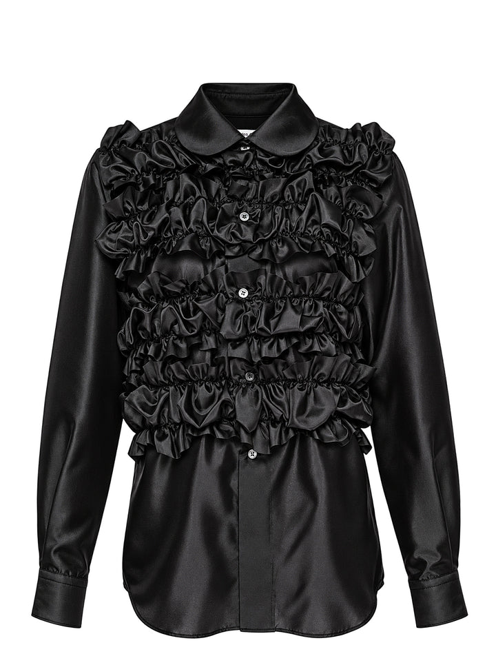 Comme des Garçons Comme des Garçons black satin blouse with dramatic tiered gathered ruffle bib front, long sleeves, point collar, and button fastening, on a white background