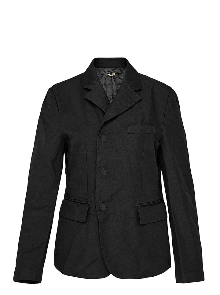 Comme des Garçons Comme des Garçons black tailored single-breasted blazer with notched lapels, three-button closure, chest welt pocket, and flap pockets at the hem, displayed flat on a white background.