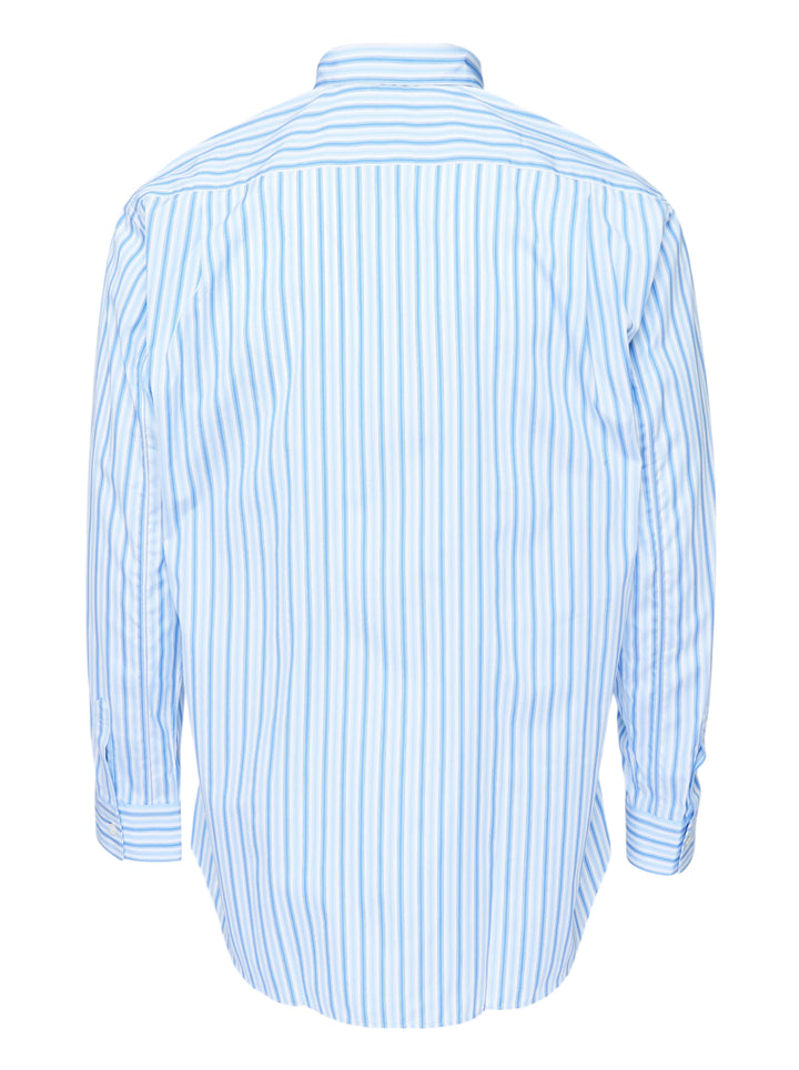 Comme des Garçons Shirt light blue and white striped long sleeve button-up shirt with two oversized metallic gold patch pockets, shown from the front - view 2