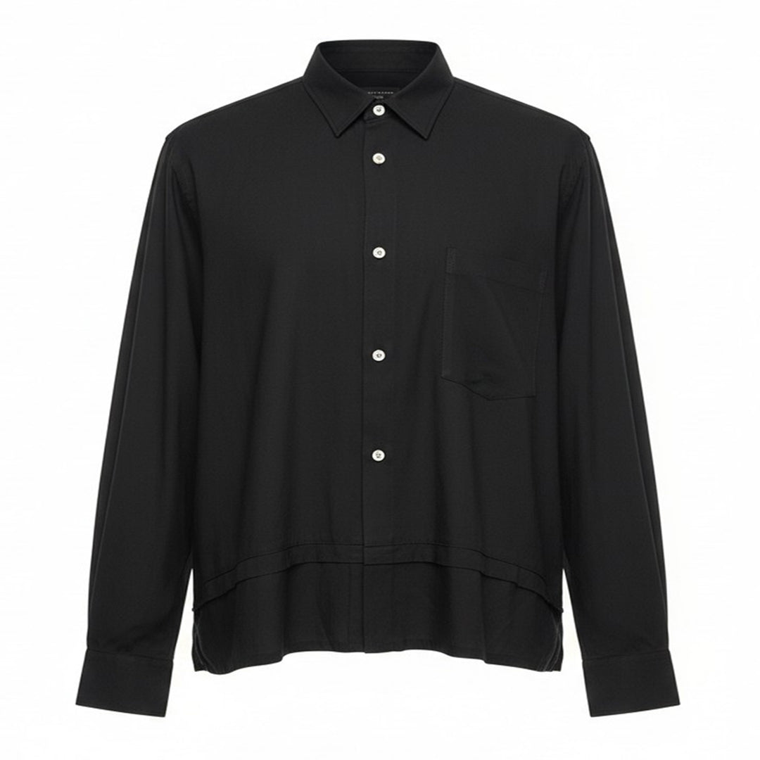 Comme des Garçons Homme Plus black polyester broad long sleeve shirt with layered hem, chest pocket, and mother-of-pearl button fastening, front view