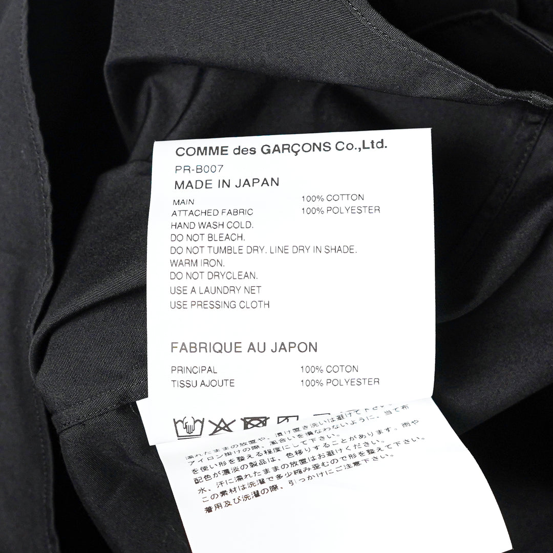 Comme des Garçons Homme Plus black long sleeve cotton shirt with floral guipure lace panel across the upper chest and shoulder yoke, white button fastening, and single patch pocket - view 3