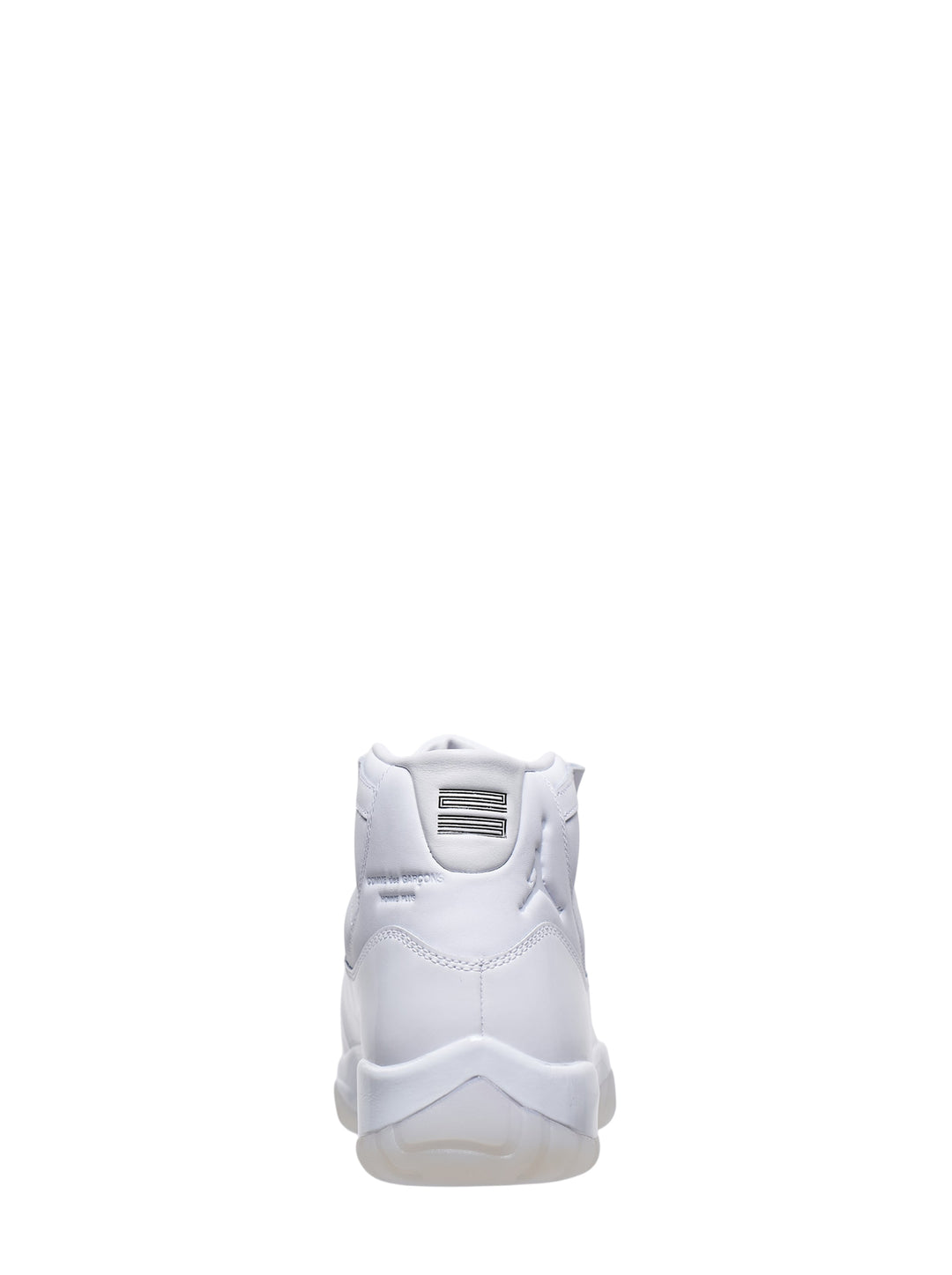 Comme des Garçons Homme Plus x Jordan Air Jordan 11 high-top sneaker in all-white leather with translucent outsole, flat white laces, and Jumpman branding at the ankle collar - view 3
