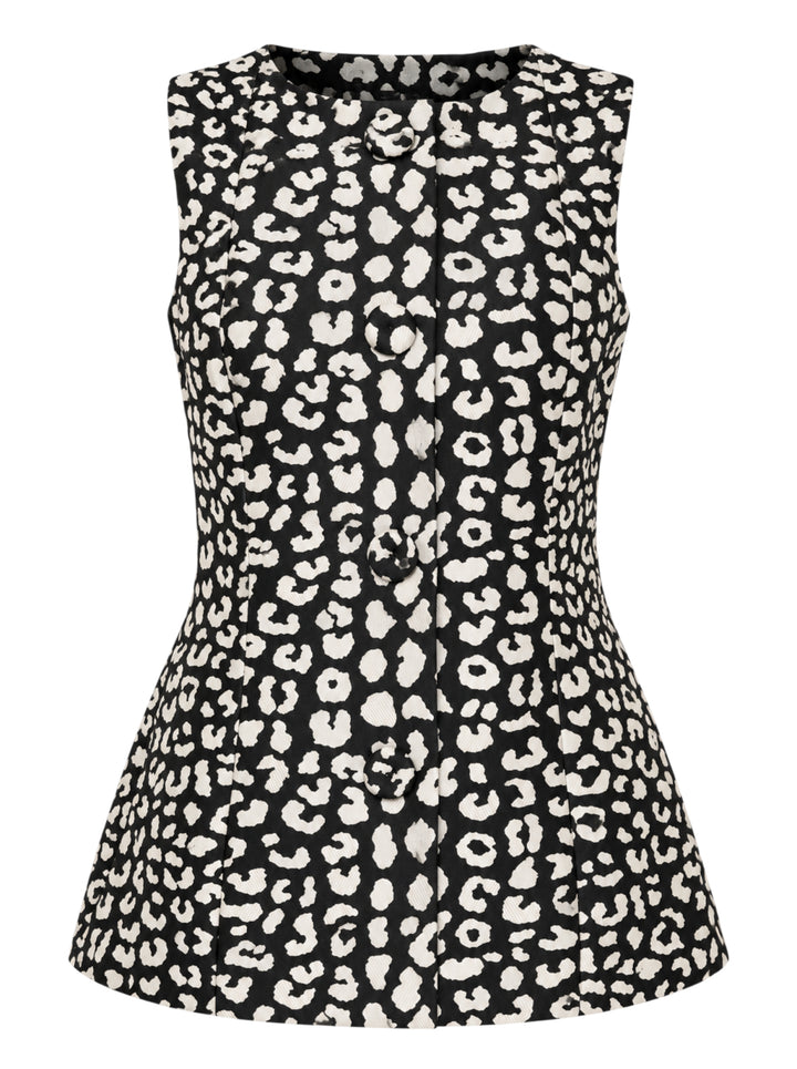 Carolina Herrera sleeveless boatneck top in black-and-ivory leopard jacquard, featuring a centre-front covered button placket, fitted waist, and flared peplum hem with box pleats