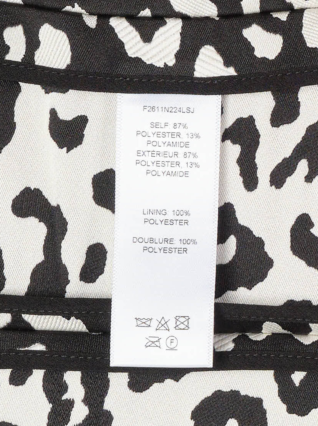 Carolina Herrera sleeveless boatneck top in black-and-ivory leopard jacquard, featuring a centre-front covered button placket, fitted waist, and flared peplum hem with box pleats - view 3