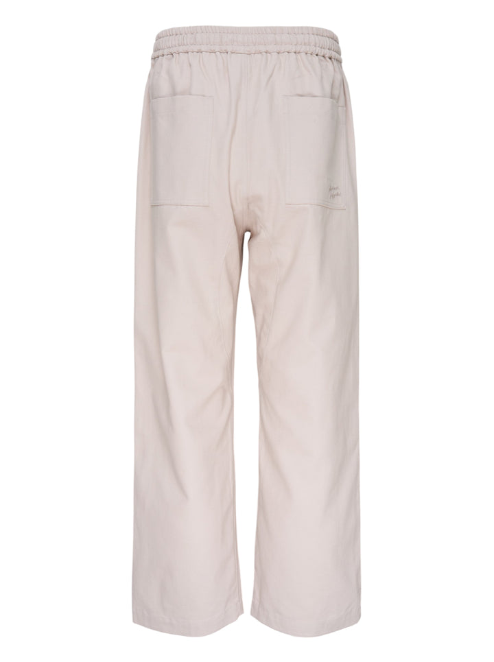 Maison Kitsuné Workwear Wide Leg Pants in blush beige with elasticated drawstring waist and front patch pockets, straight wide-leg silhouette, front view on white background - view 2