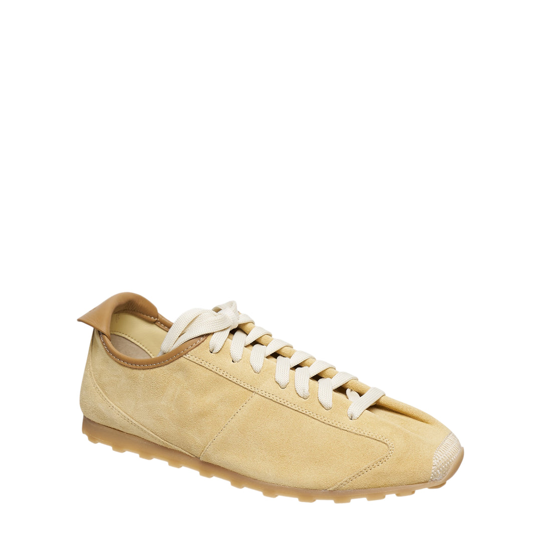 Jacquemus Les Tennis suede sneaker in sandy beige with cream flat laces, leather heel tab, and a gum rubber outsole, shown in profile - view 2