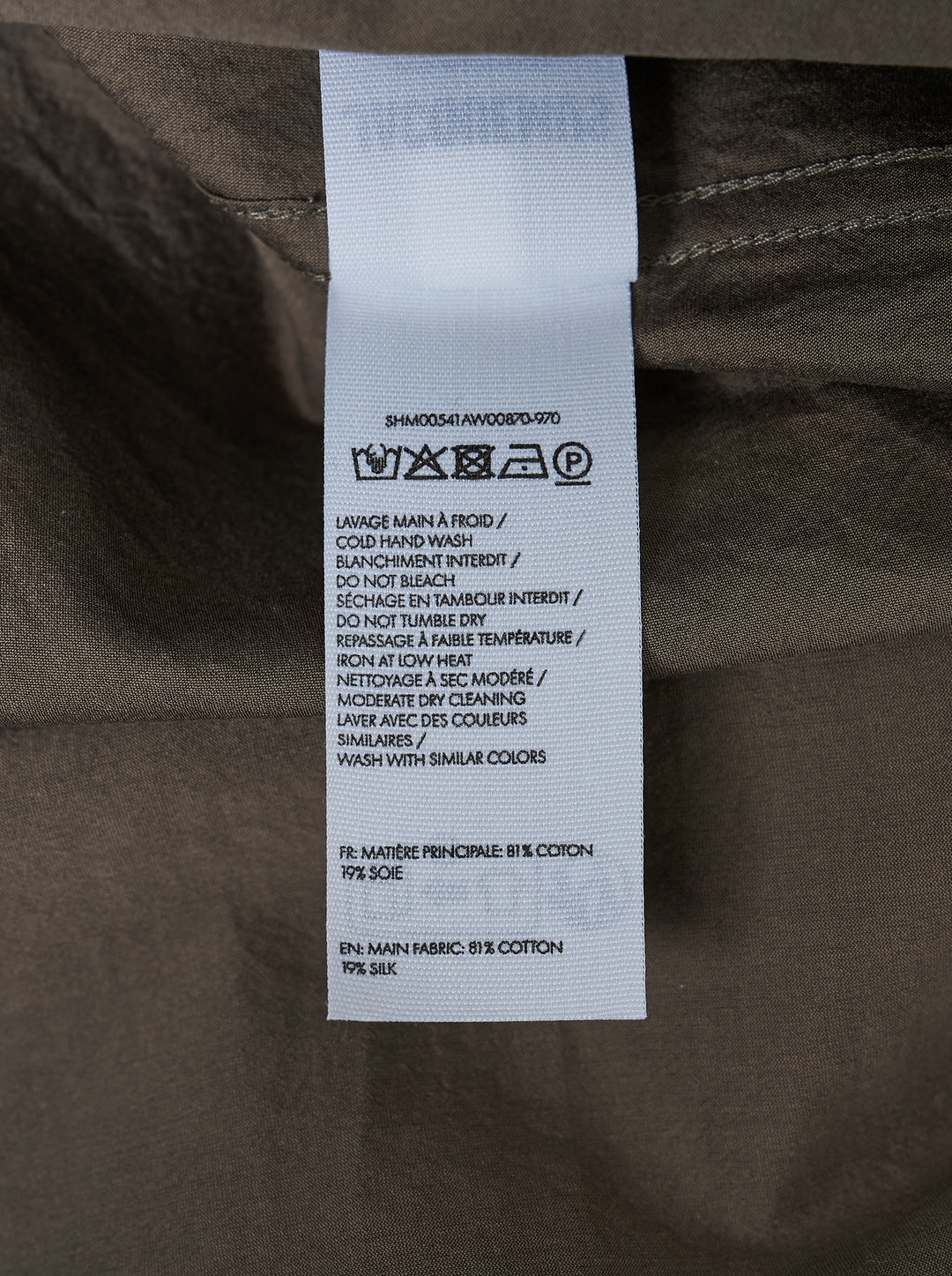 Jacquemus Simon long sleeve shirt in taupe with a lustrous crinkled finish, concealed button placket and small script embroidery at the hem - view 4
