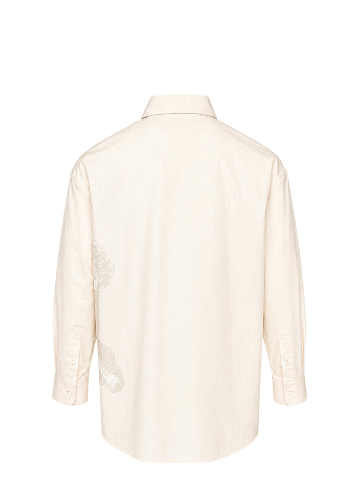 Jacquemus Pisco long sleeve cream shirt with an oversized tonal poodle print and a contrast dark button at the eye - view 2
