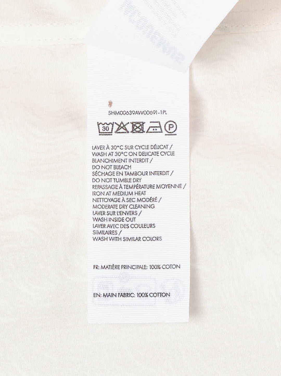 Jacquemus Pisco long sleeve cream shirt with an oversized tonal poodle print and a contrast dark button at the eye - view 3