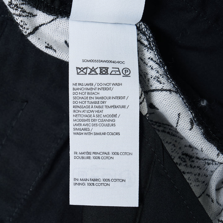 Jacquemus Le Short Pyjama wide-leg shorts with an all-over black and white fish-school graphic print, featuring a high-rise waistband with twin button fastening - view 3
