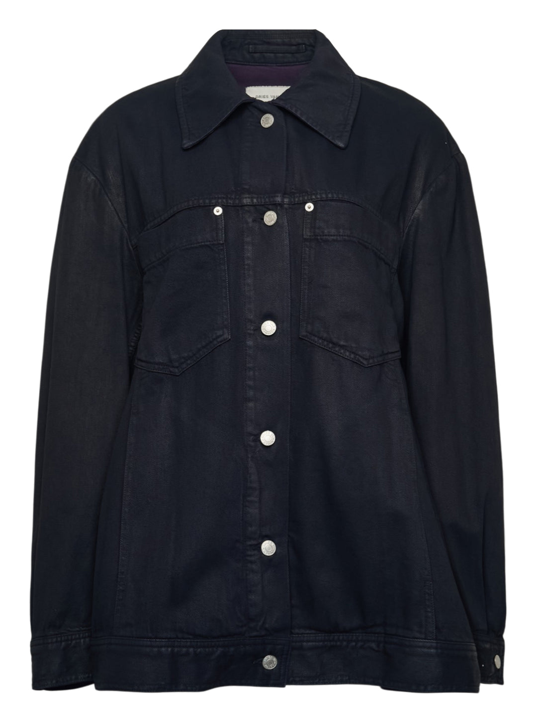 Dries Van Noten oversized black denim jacket with silver snap buttons, dual chest pockets, and trucker-style yoke seaming, displayed flat on a white background