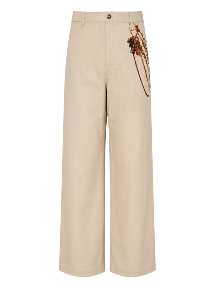 doublet Trompe L'Oeil Embroidery Chinos in sand, featuring a wide-leg silhouette and a detailed embroidery of a key ring with chains and keys at the hip