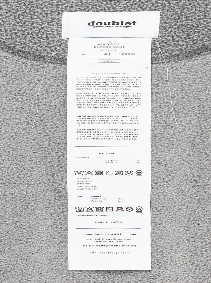 doublet Air Yarn Fleece Vest in heather grey with speckled bouclé texture, full-zip stand collar, contrast black binding at armholes, and embroidered triangle logo on the chest - view 3
