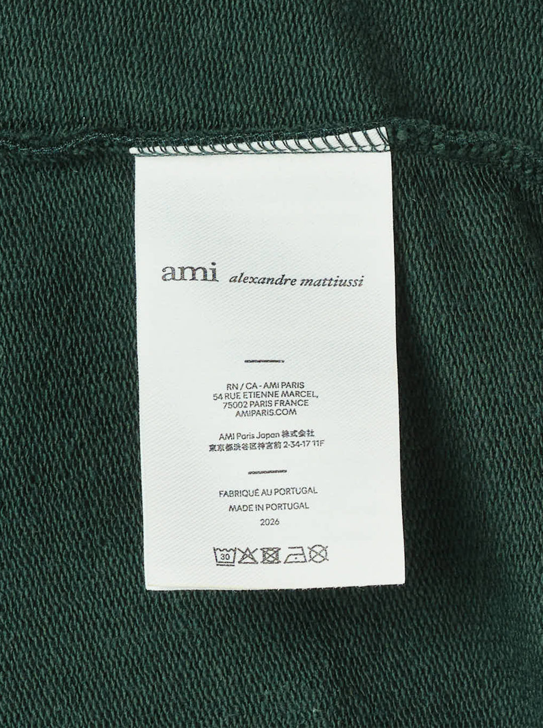 AMI Alexandre Mattiussi forest green zip hoodie with embroidered Ami de Cœur heart logo on the chest, full-length silver zip, kangaroo pocket, and adjustable tonal drawstring hood - view 4