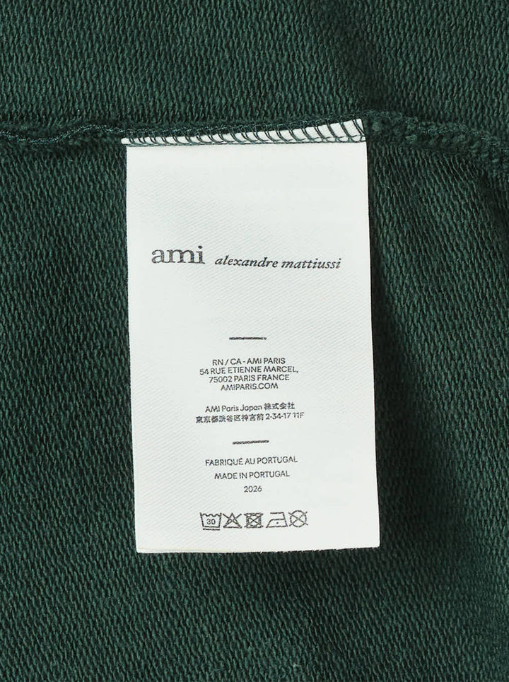 AMI Alexandre Mattiussi forest green zip hoodie with embroidered Ami de Cœur heart logo on the chest, full-length silver zip, kangaroo pocket, and adjustable tonal drawstring hood - view 4