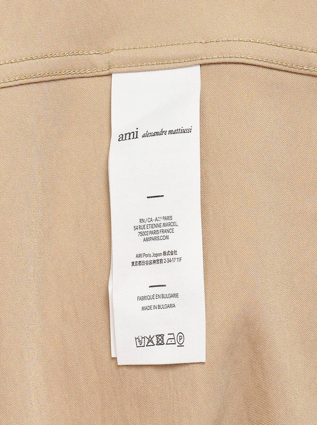 AMI Alexandre Mattiussi short sleeve boxy shirt in beige with camp collar, white shell buttons, and tonal AMI script embroidery at the chest - view 4
