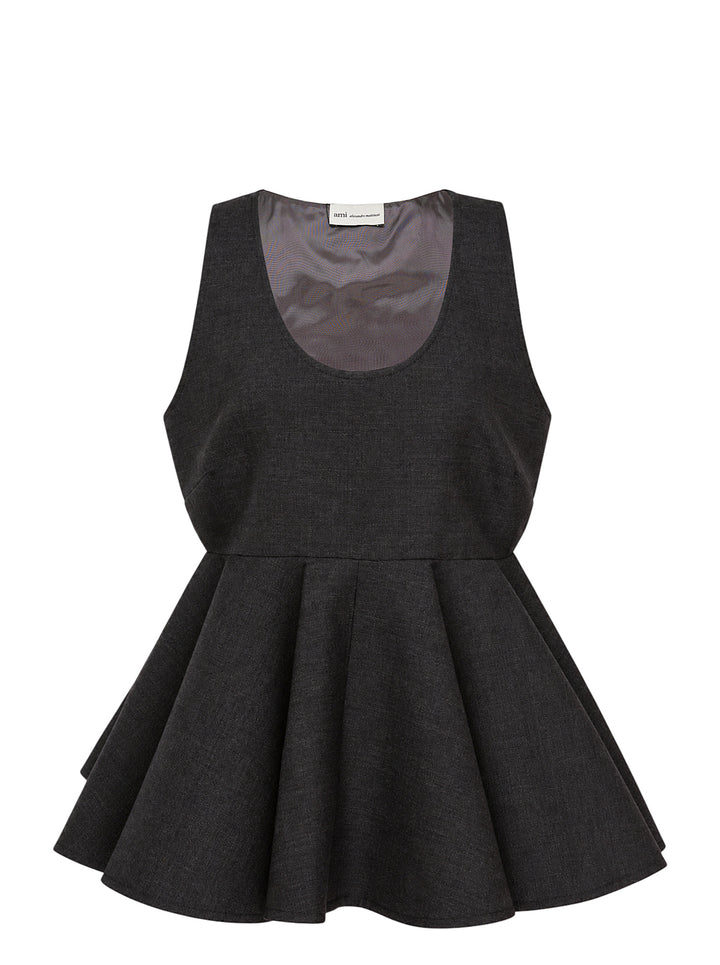 AMI sleeveless peplum top in charcoal grey with a scoop neckline and flared, pleated peplum hem