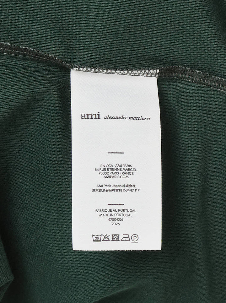 Ami Alexandre Mattiussi forest green bicolor ringer tee with cream contrast collar and cuff trim, featuring the embroidered Ami de Cœur logo at the chest - view 4