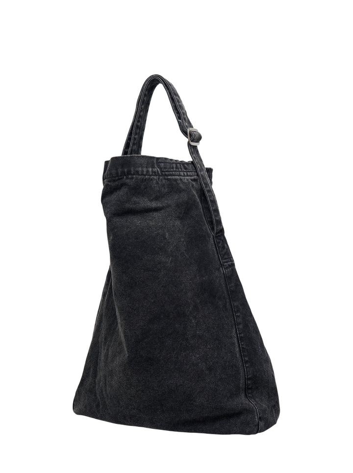 Our Legacy washed black denim sling crossbody bag with adjustable strap and drawstring top closure, rear view - view 2